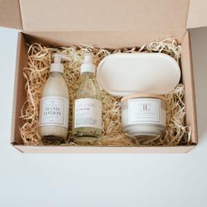 hand lotion room spritzer soy wax candle and a trinket tray presented in a gift box