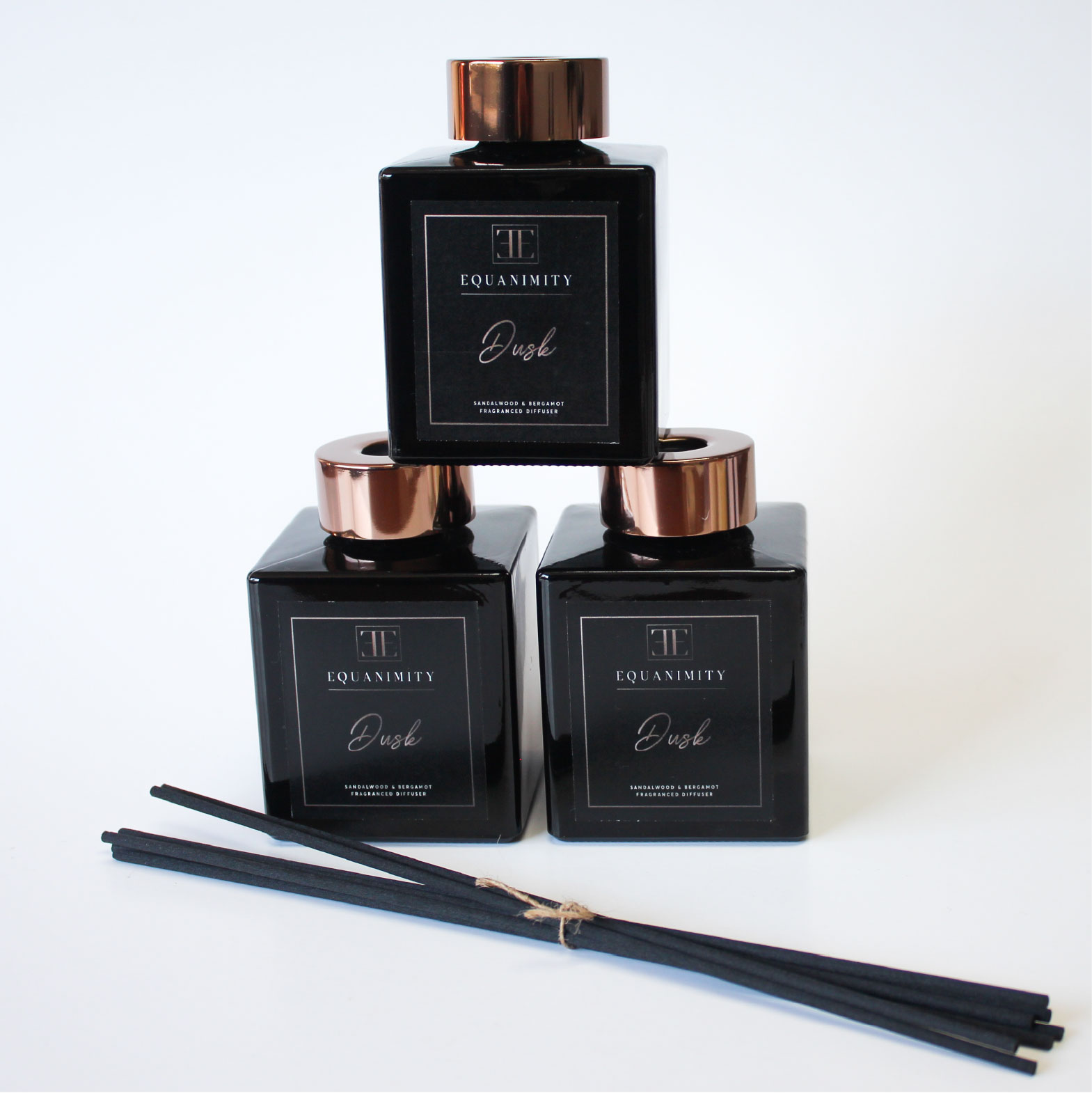 black diffuser with gold lid